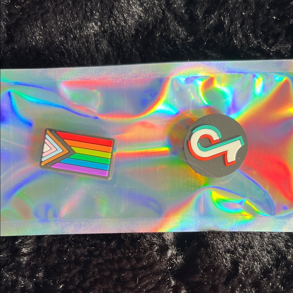 Colorful Pride and Logo Pins